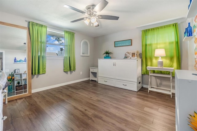 bedroom featuring ceiling fan and hardwood / wood-style floors