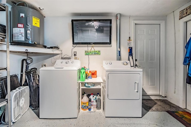 laundry area featuring washer and dryer and electric water heater