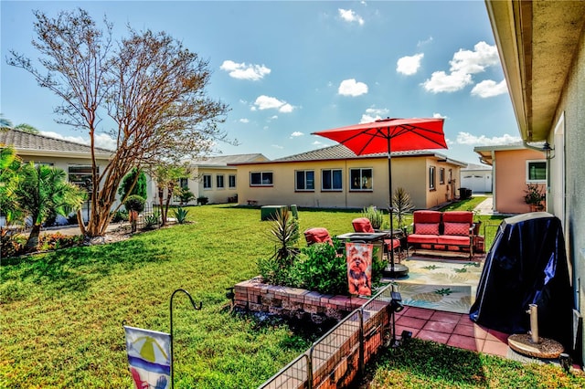 view of yard featuring a patio area and an outdoor hangout area