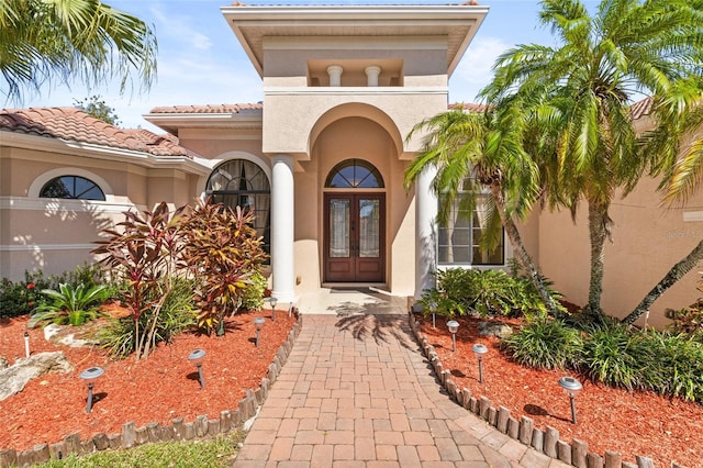 doorway to property featuring french doors