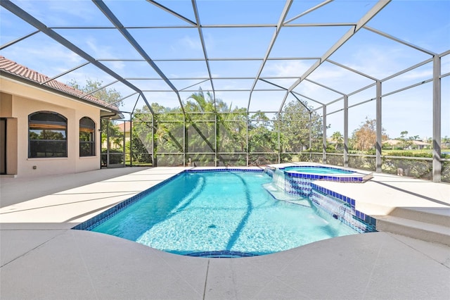 view of swimming pool featuring glass enclosure, an in ground hot tub, a patio area, and pool water feature