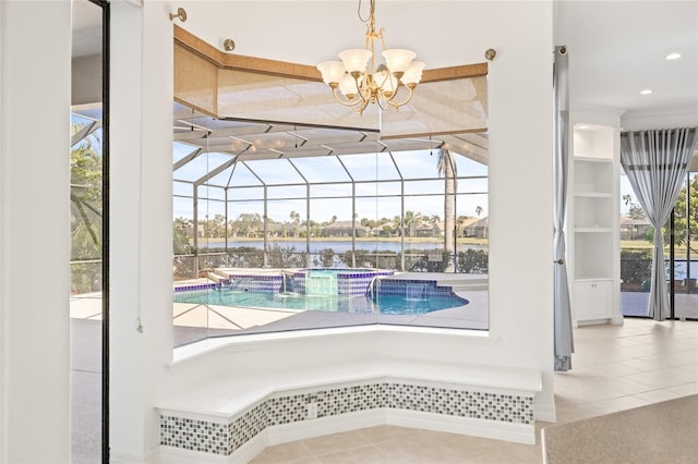 view of pool with a water view and an inviting chandelier