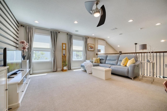 2001 Palm Key Ave, Oldsmar, FL 34677 - living area featuring carpet flooring, baseboards, recessed lighting, a ceiling fan, and vaulted ceiling