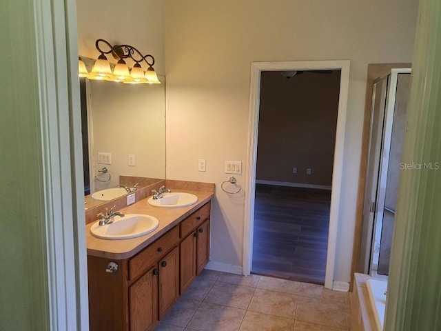 bathroom featuring vanity, hardwood / wood-style floors, and separate shower and tub