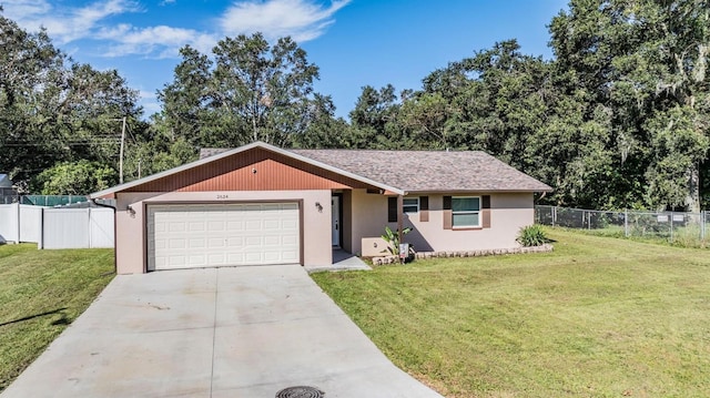 ranch-style home featuring a front yard and a garage