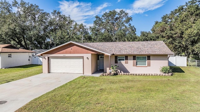 single story home featuring a front yard and a garage