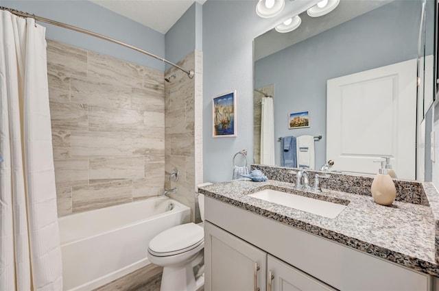 full bathroom with toilet, vanity, shower / tub combo, and hardwood / wood-style floors