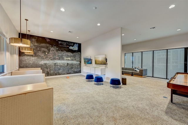 living room featuring light carpet