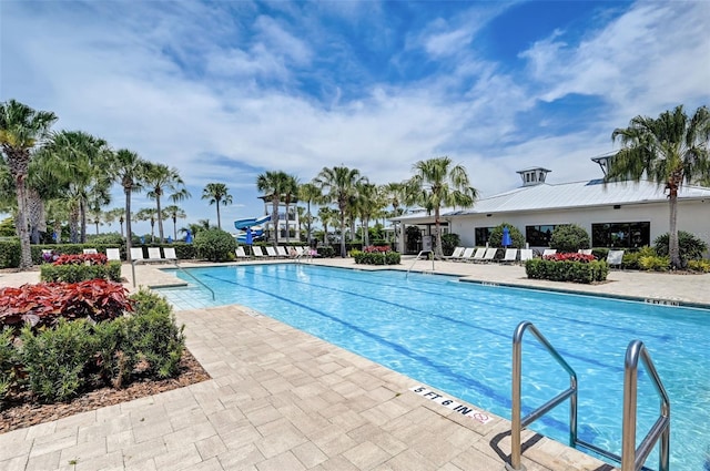 view of swimming pool featuring a patio area