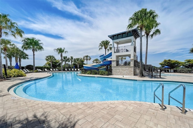 view of swimming pool featuring a water slide