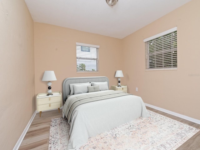 bedroom featuring light wood-type flooring