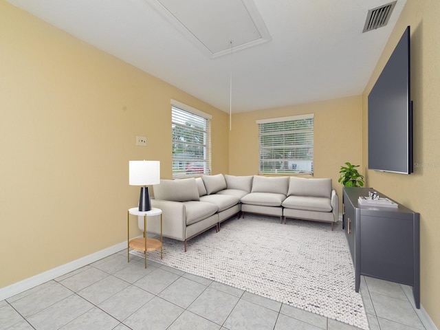 living room with light tile patterned flooring