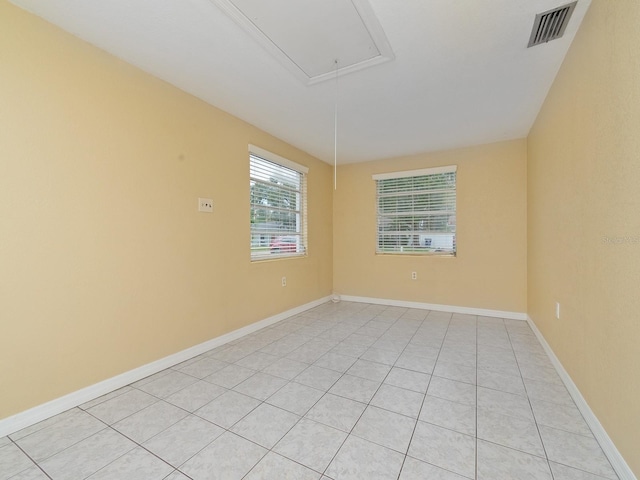 view of tiled spare room