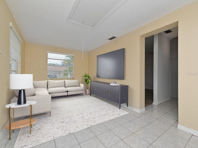 living room with light tile patterned floors