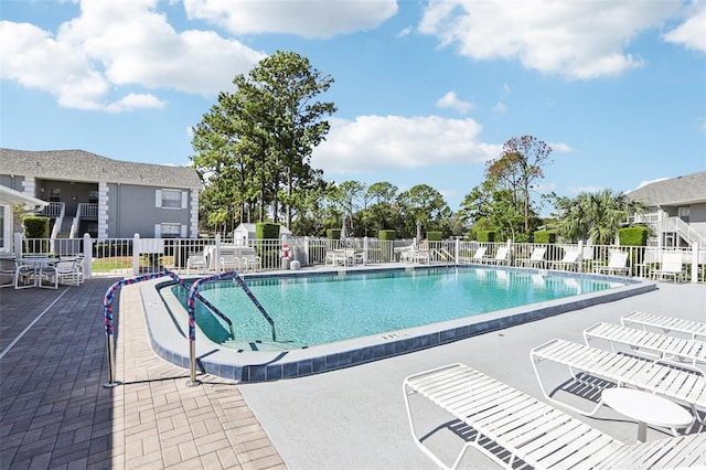 view of pool featuring a patio area