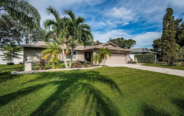 ranch-style house featuring a front yard and a garage