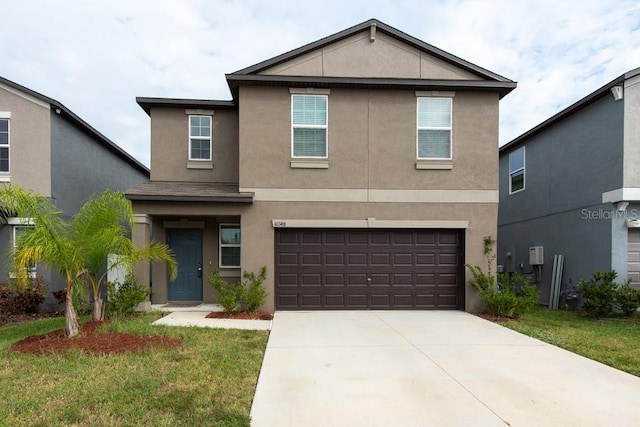 10348 Blue Plume Ct, Riverview, FL 33578 - view of front facade featuring stucco siding, concrete driveway, and a garage