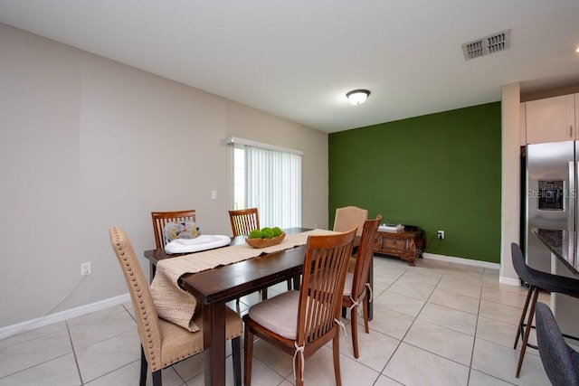 view of tiled dining space