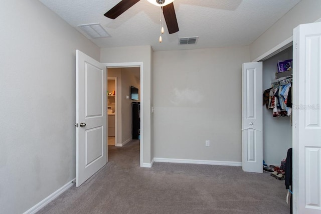 10348 Blue Plume Ct, Riverview, FL 33578 - unfurnished bedroom with carpet flooring, a textured ceiling, baseboards, and a ceiling fan