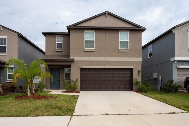 10348 Blue Plume Ct, Riverview, FL 33578 - traditional-style house with stucco siding, an attached garage, driveway, and a front lawn