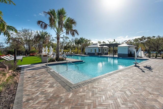 view of swimming pool with a patio