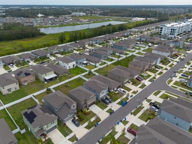 bird's eye view with a water view