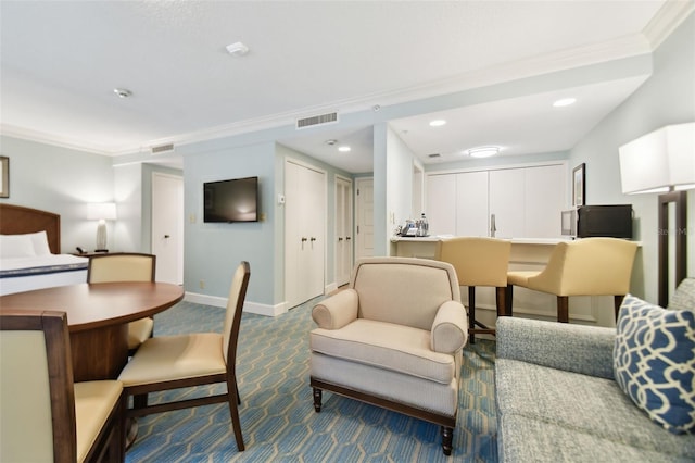 36750 US Highway 19 Unit 21212, Palm Harbor, FL 34684 - living area with carpet flooring, visible vents, wet bar, baseboards, and ornamental molding