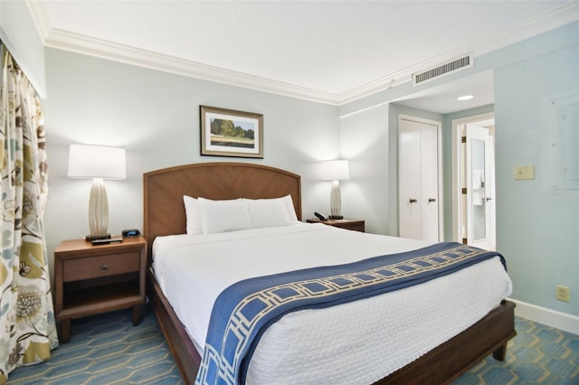 36750 US Highway 19 Unit 21212, Palm Harbor, FL 34684 - bedroom with carpet, visible vents, crown molding, and baseboards