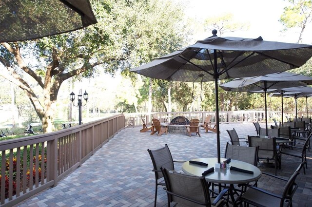 view of patio featuring a fire pit