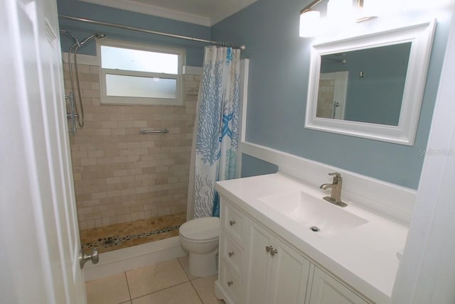 bathroom with tile patterned flooring, vanity, toilet, and curtained shower