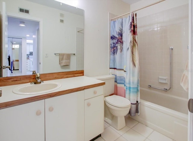 full bathroom featuring vanity, shower / bath combination with curtain, tile patterned floors, and toilet