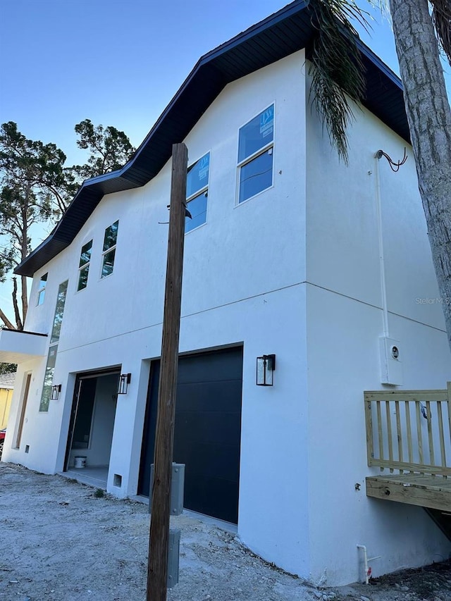 view of home's exterior with a garage