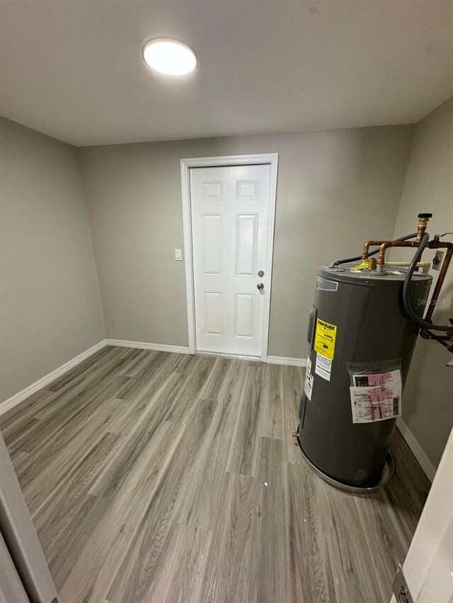 5928 13th Street Ct E, Bradenton, FL 34203 - utility room with electric water heater
