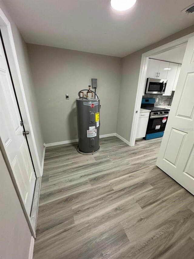 5928 13th Street Ct E, Bradenton, FL 34203 - utilities with electric water heater and visible vents