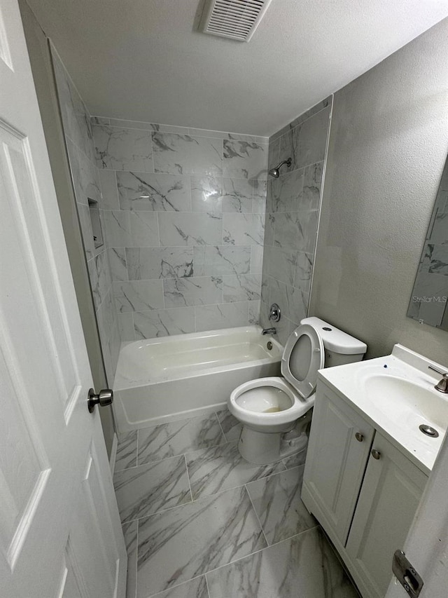 5928 13th Street Ct E, Bradenton, FL 34203 - full bath with marble finish floor, bathing tub / shower combination, visible vents, toilet, and vanity