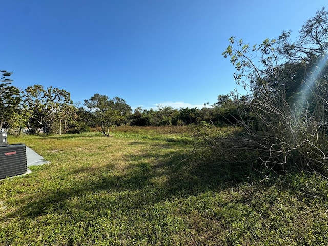 5928 13th Street Ct E, Bradenton, FL 34203 - view of yard with central air condition unit