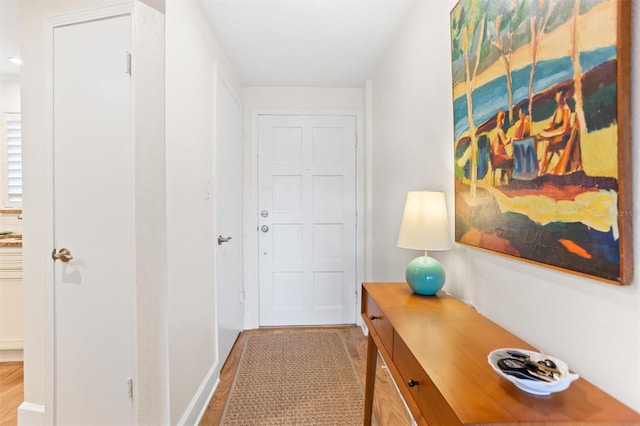 hallway featuring light wood-type flooring