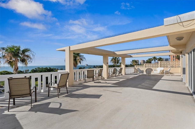 view of patio / terrace with a water view