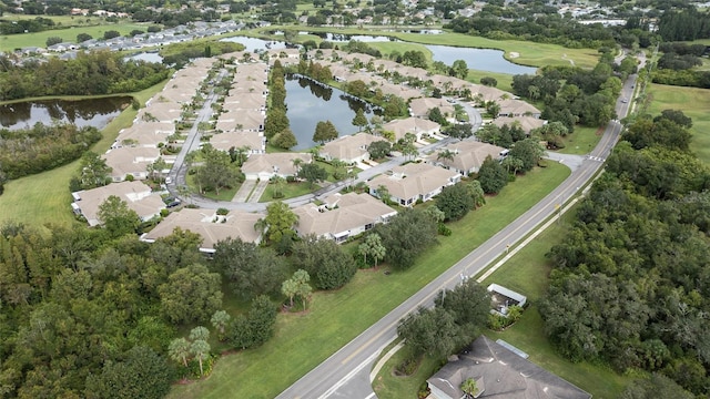 birds eye view of property featuring a residential view and a water view