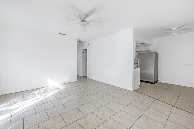 unfurnished room featuring ceiling fan