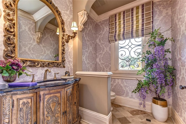 bathroom with vanity and toilet