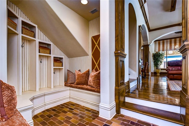 mudroom with decorative columns