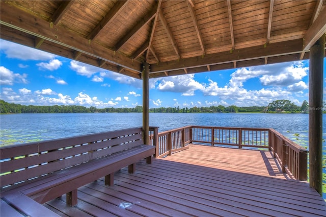 view of dock featuring a gazebo and a water view