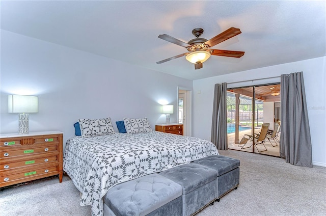 bedroom featuring access to exterior, light colored carpet, and ceiling fan