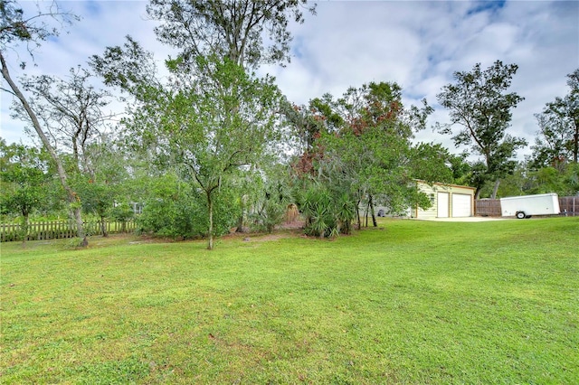 view of yard featuring a garage