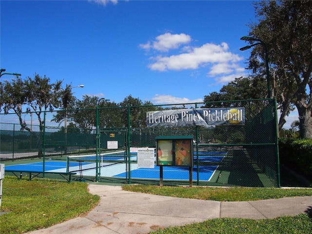 view of basketball court with tennis court