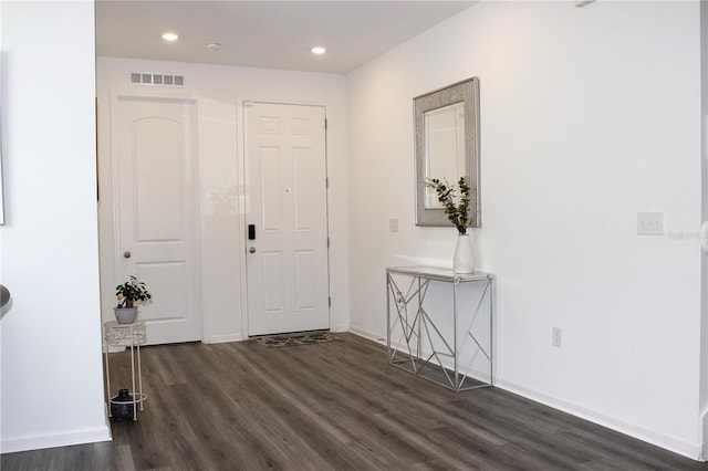 foyer with dark hardwood / wood-style flooring