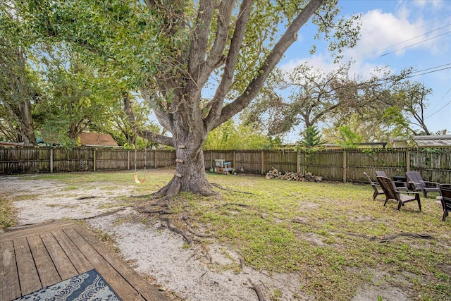 view of yard with a wooden deck