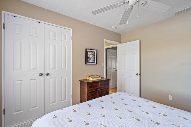 bedroom featuring a closet and ceiling fan