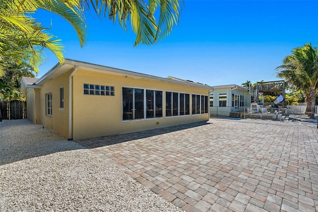 back of house featuring a patio